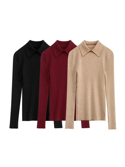 The collared jumper laid flat in its three colours, black, bordeaux and camel, supplier photograph