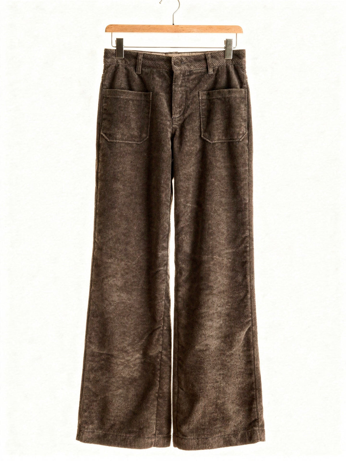 Cord trousers in Pinecone, front view on a wooden hanger, showing the two front patch pockets