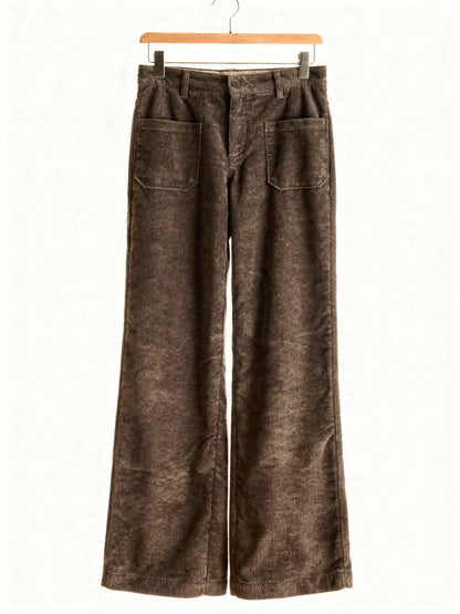 Cord trousers in Pinecone, front view on a wooden hanger, showing the two front patch pockets