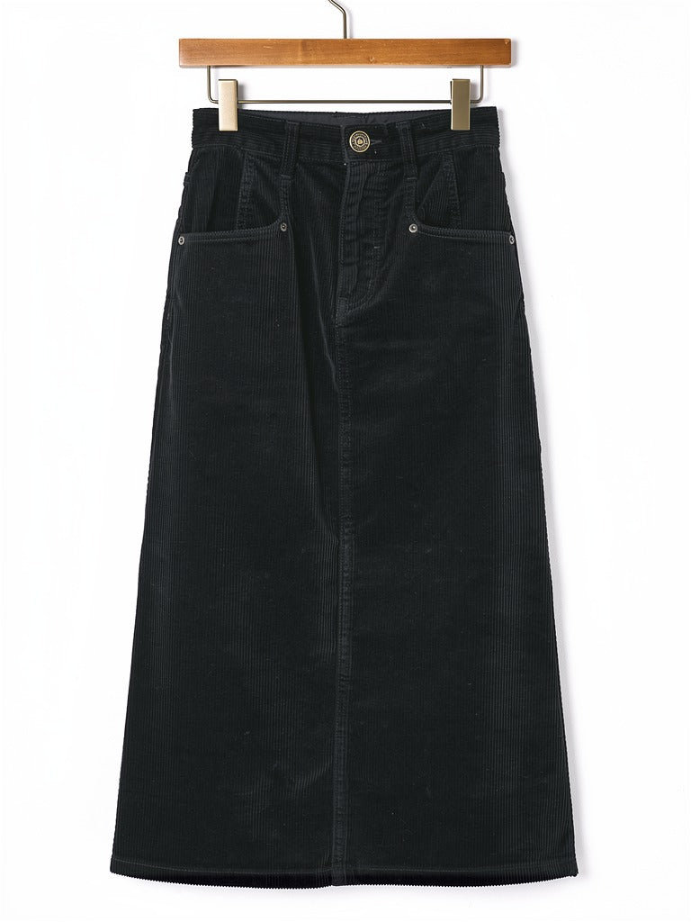 Corduroy skirt in Sloe black on a wooden hanger, front view, showing the angled rivet pockets, the antique brass button and the belt loops