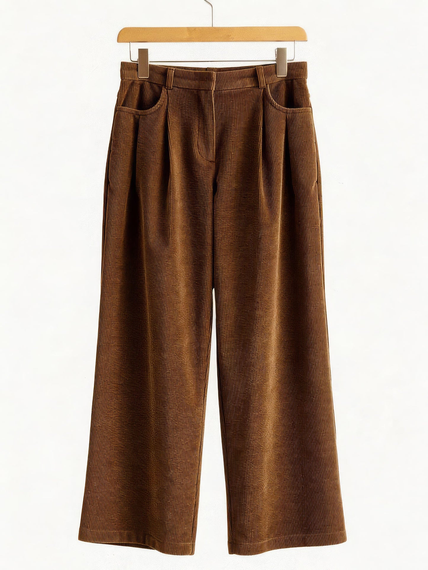 Corduroy wide-leg trousers in Tobacco, front view on a wooden hanger