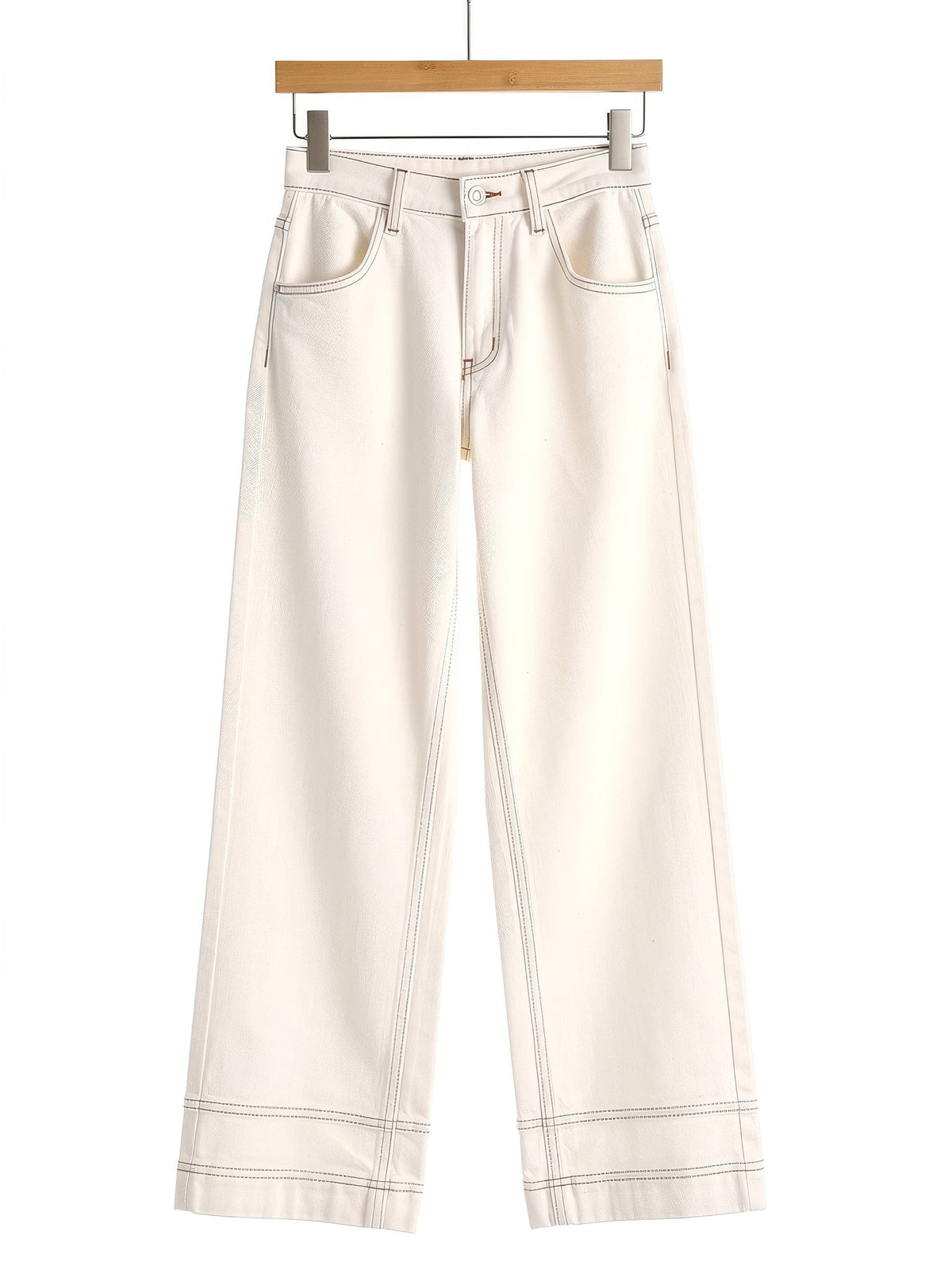 Cream jeans on a wooden hanger, front view, high-rise wide leg with camel contrast stitching