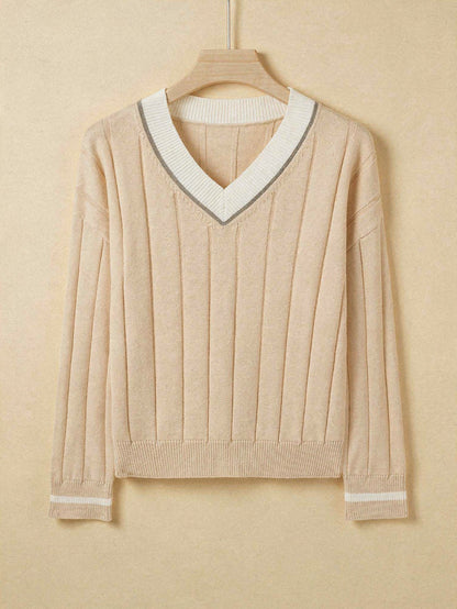 Stone V-neck cricket jumper with contrast ivory collar on a wooden hanger