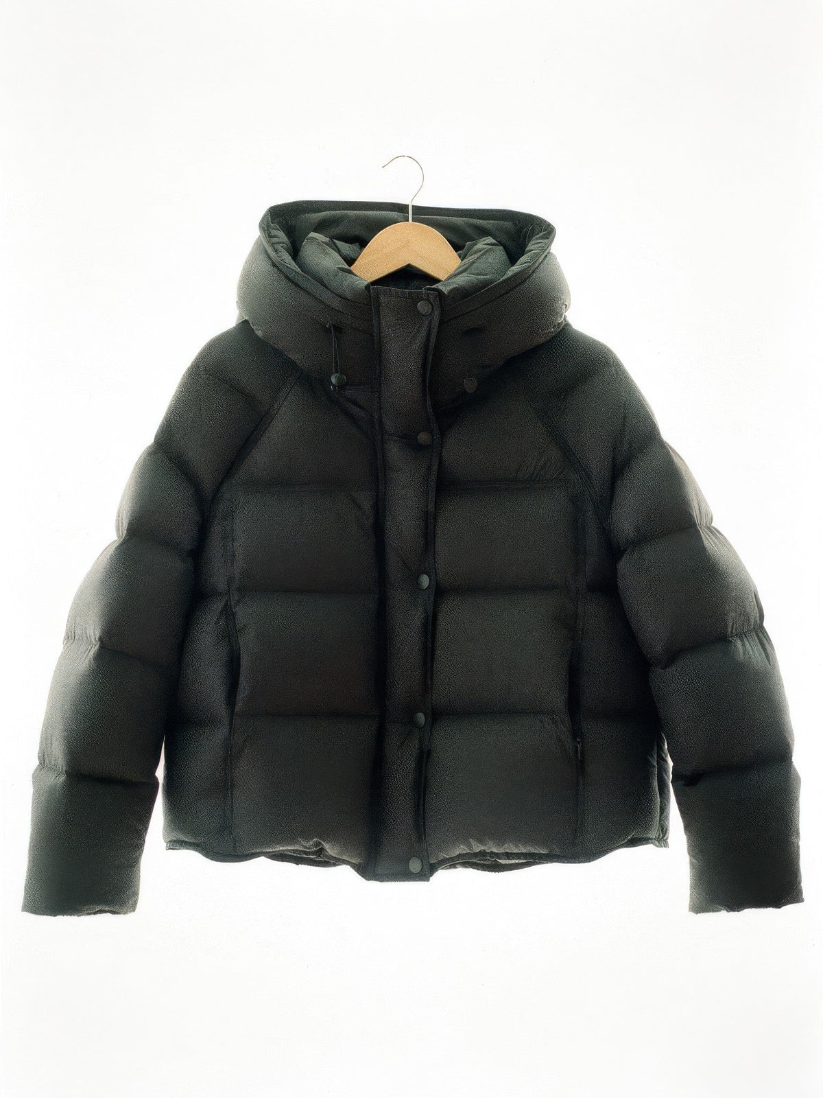 Black cropped puffer jacket on a hanger, box quilted with a padded hood