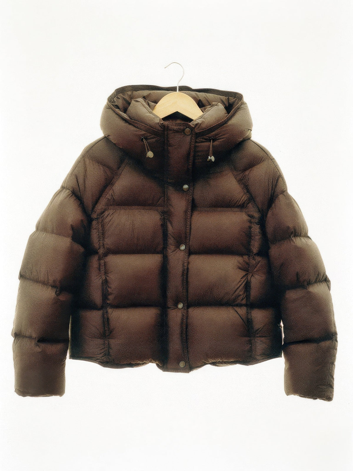 Truffle Brown cropped puffer jacket on a hanger, box quilted with a padded drawcord hood