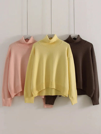 The cropped turtleneck jumper in blush pink, butter yellow and taupe side by side
