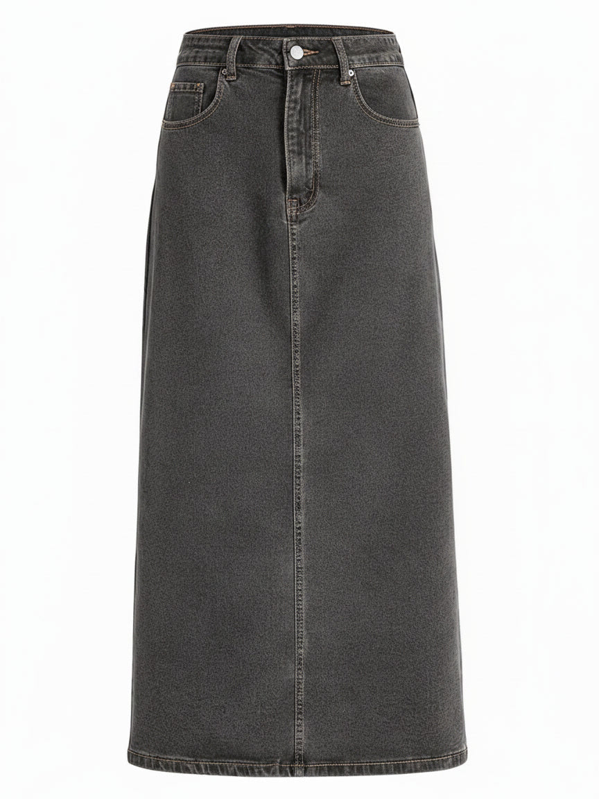 Denim maxi skirt in Cinder washed charcoal denim, front view showing the button waistband and the scoop pockets