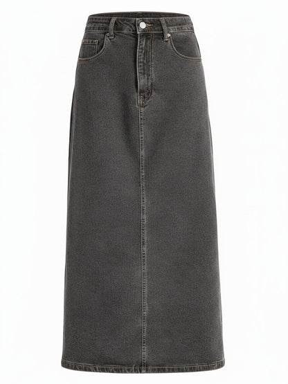 Denim maxi skirt in Cinder washed charcoal denim, front view showing the button waistband and the scoop pockets