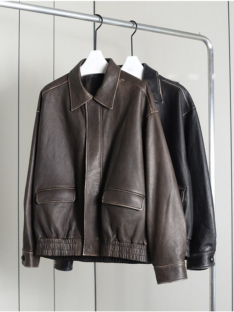 Distressed faux leather bomber jacket shown in both colourways, Bison and Char