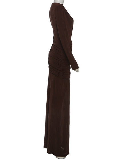 Draped maxi dress in Bourbon seen from the side, showing the draped hip panel