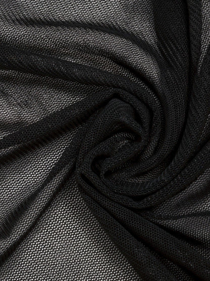 Close up of the fine black stretch mesh the draped top is cut from