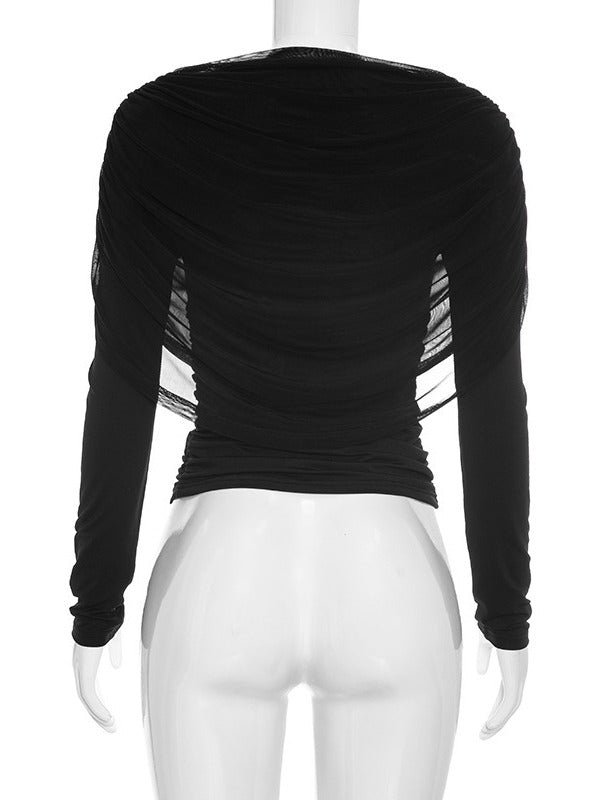 Back view of the draped top, shawl collar draping across the shoulders
