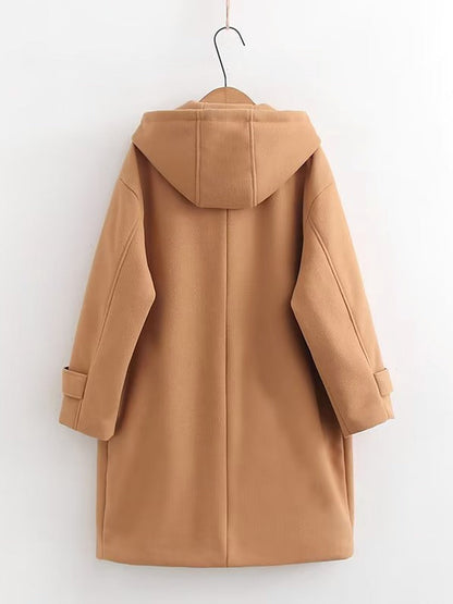 Back of a camel duffle coat showing the fixed hood