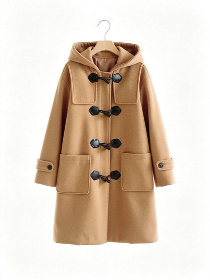 Camel duffle coat on a hanger, four horn style toggles and two patch pockets