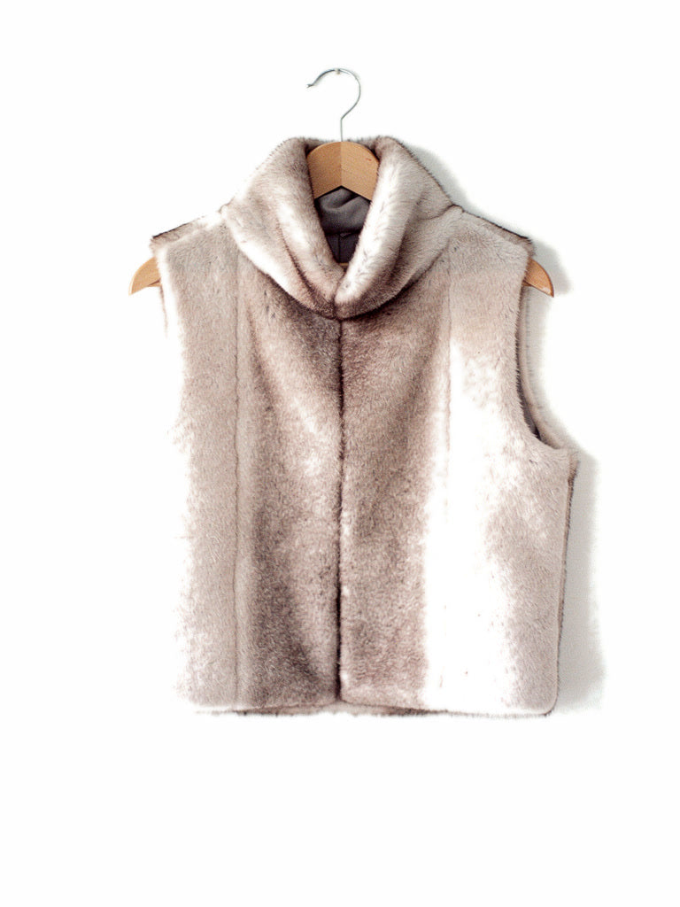 Faux fur gilet in Champagne, front view on a hanger