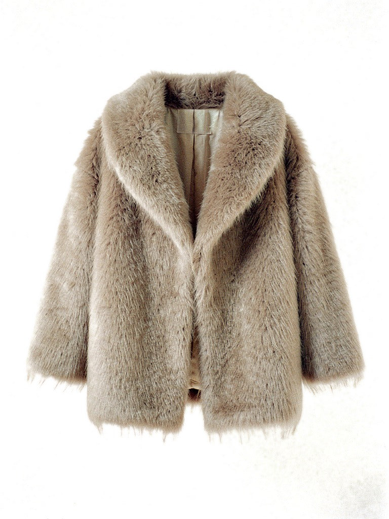 Faux fur jacket in Dune shown front on, with its wide shawl collar and open front