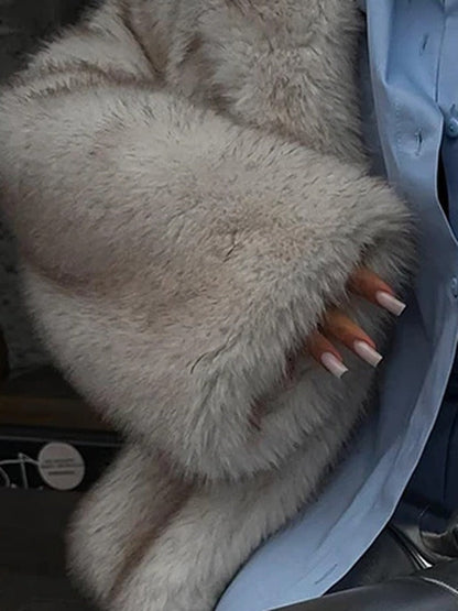 Detail of the long faux fur pile on the sleeve of the Thurlow jacket, worn over a shirt