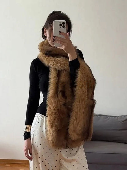 Chestnut Stripe faux fur scarf wrapped once at the neck with both ends hanging to the hip