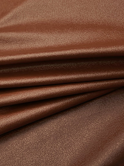 Close up of the smooth coated faux leather, showing its fine grain and soft sheen