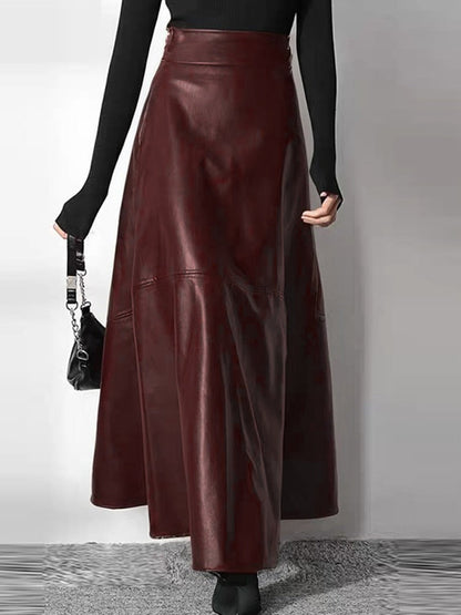 Faux leather maxi skirt in garnet seen from the back, showing the panel seams and the plain waistband