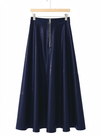 Faux leather maxi skirt in Prussian blue on a hanger, exposed front zip and full A-line hem