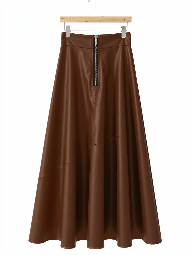 Faux leather maxi skirt in saddle brown on a hanger, exposed front zip and full A-line hem