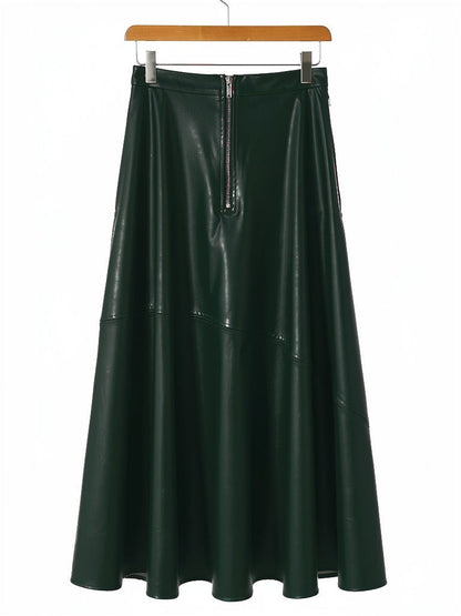 Faux leather maxi skirt in spruce green on a hanger, exposed front zip and high waistband