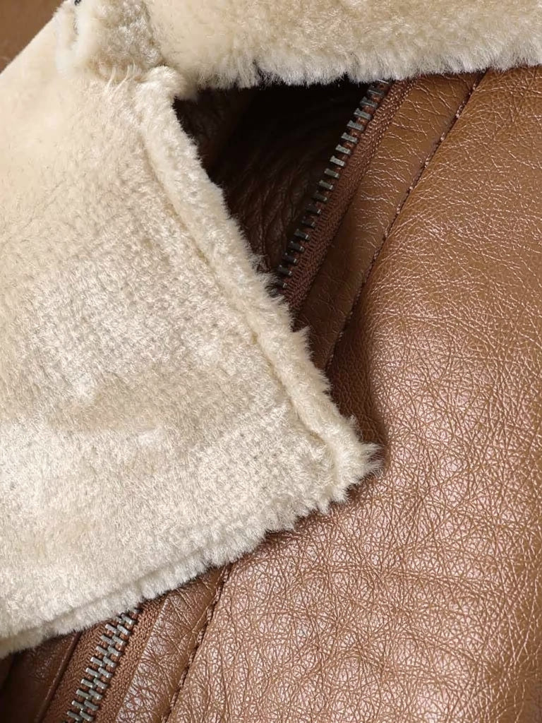 Close up of the faux shearling collar meeting the pebbled faux leather of the Batsford aviator jacket