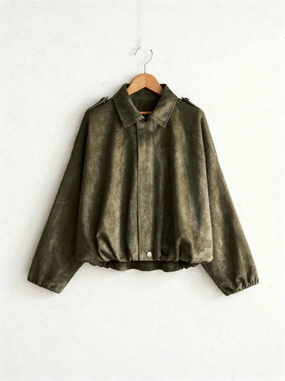 Khaki cropped faux-suede jacket with batwing sleeves on a wooden hanger