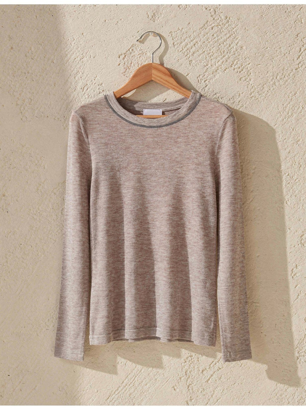 Rose taupe fine-knit shimmer jumper with a beaded collar trim on a wooden hanger