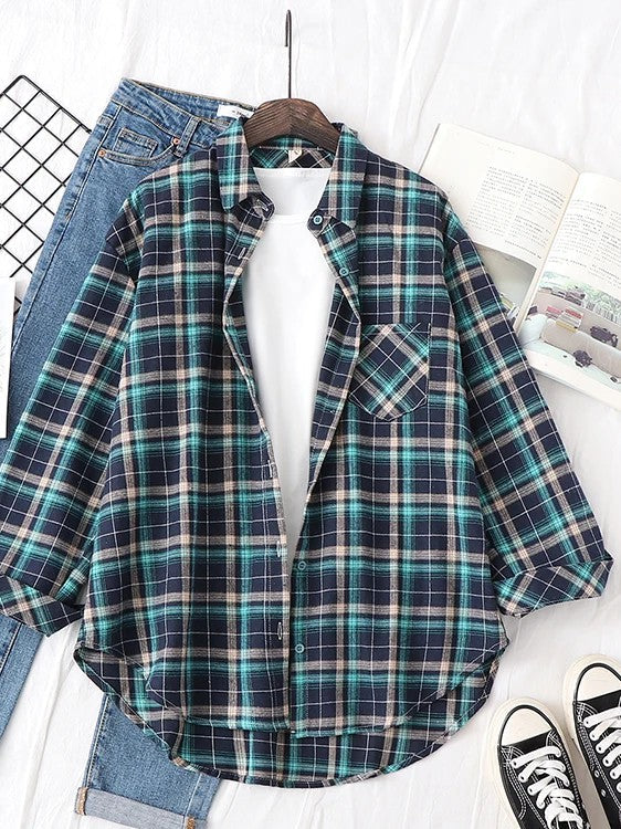 Forest green check flannel overshirt laid flat