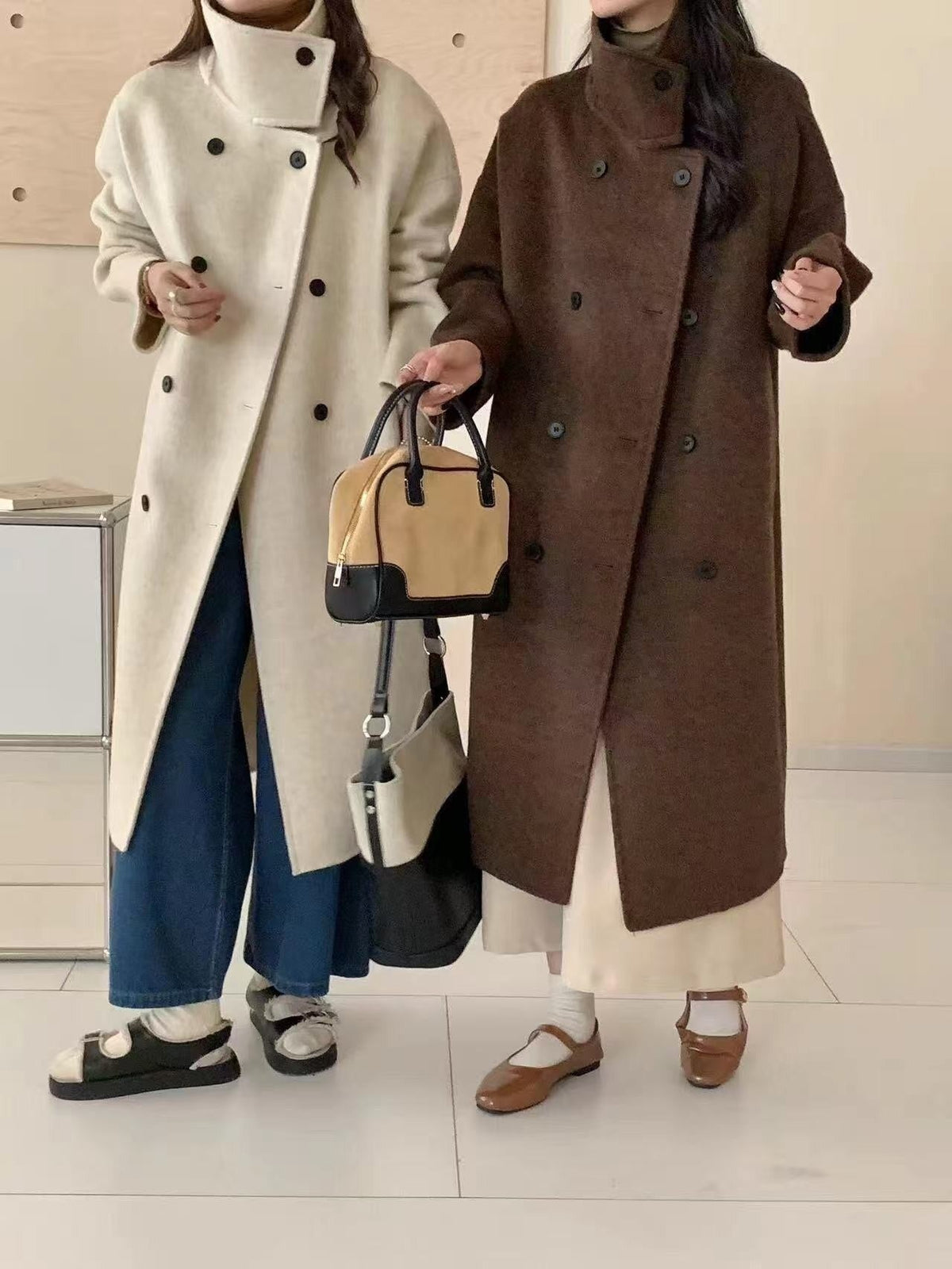 The funnel neck coat worn in Tallow cream and in Bulrush brown