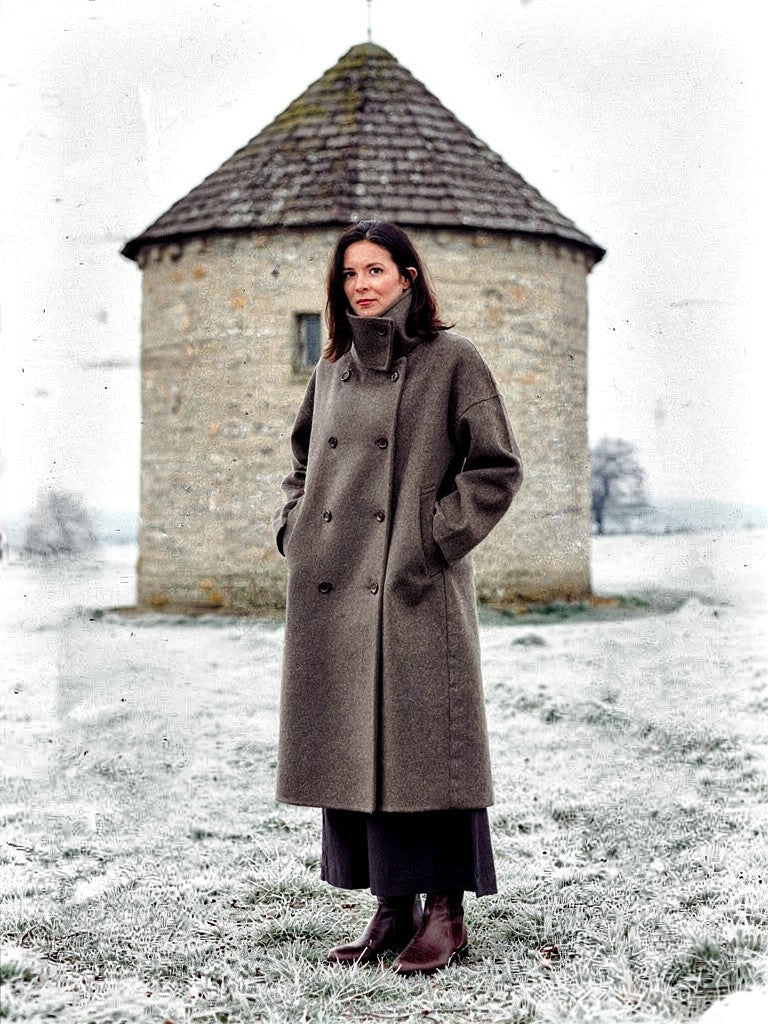 Womens funnel neck coat in Bulrush brown wool blend, collar buttoned up, worn full length
