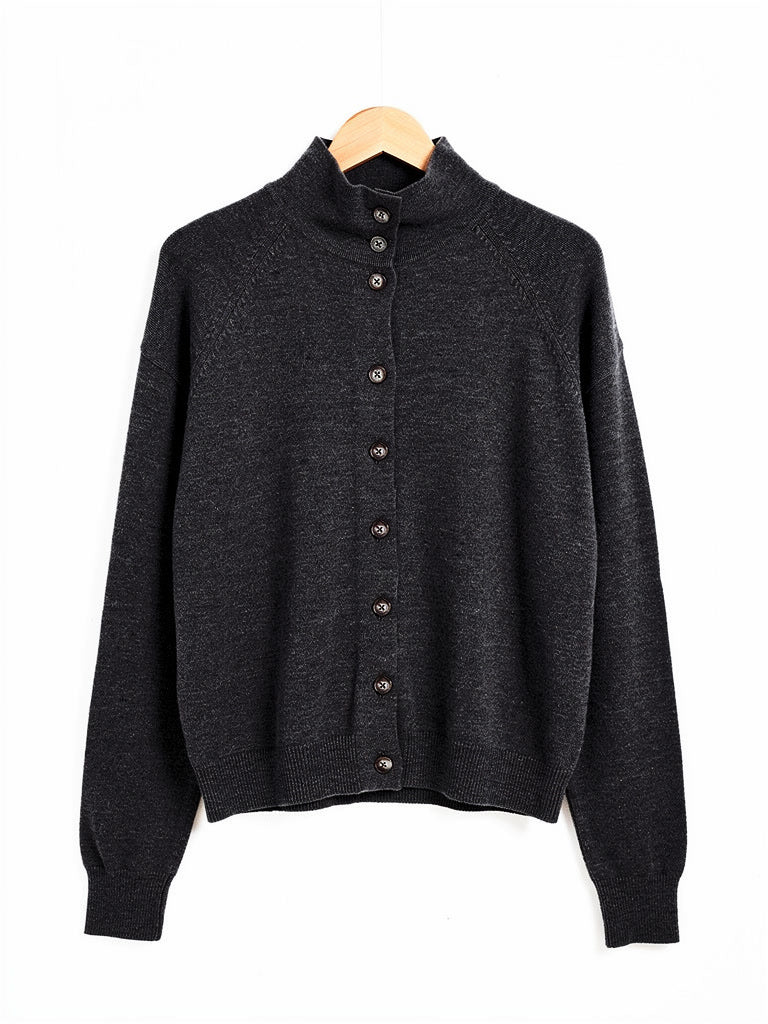 Grey cashmere cardigan with a stand collar on a hanger in Basalt