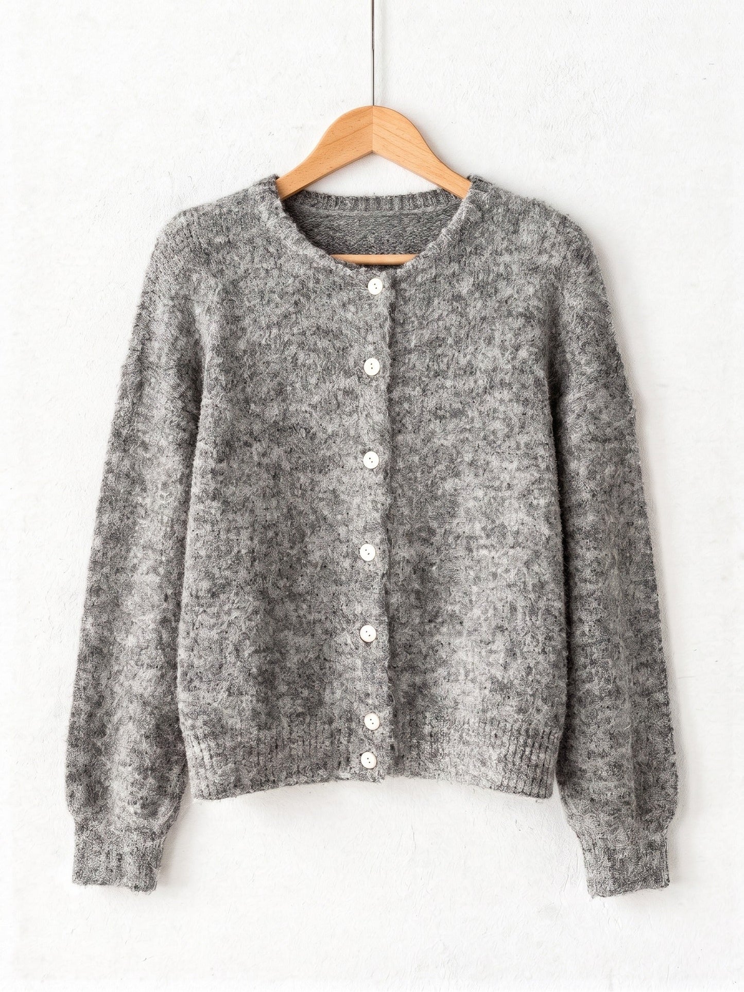 Grey marl button-through cardigan in brushed knit on a wooden hanger