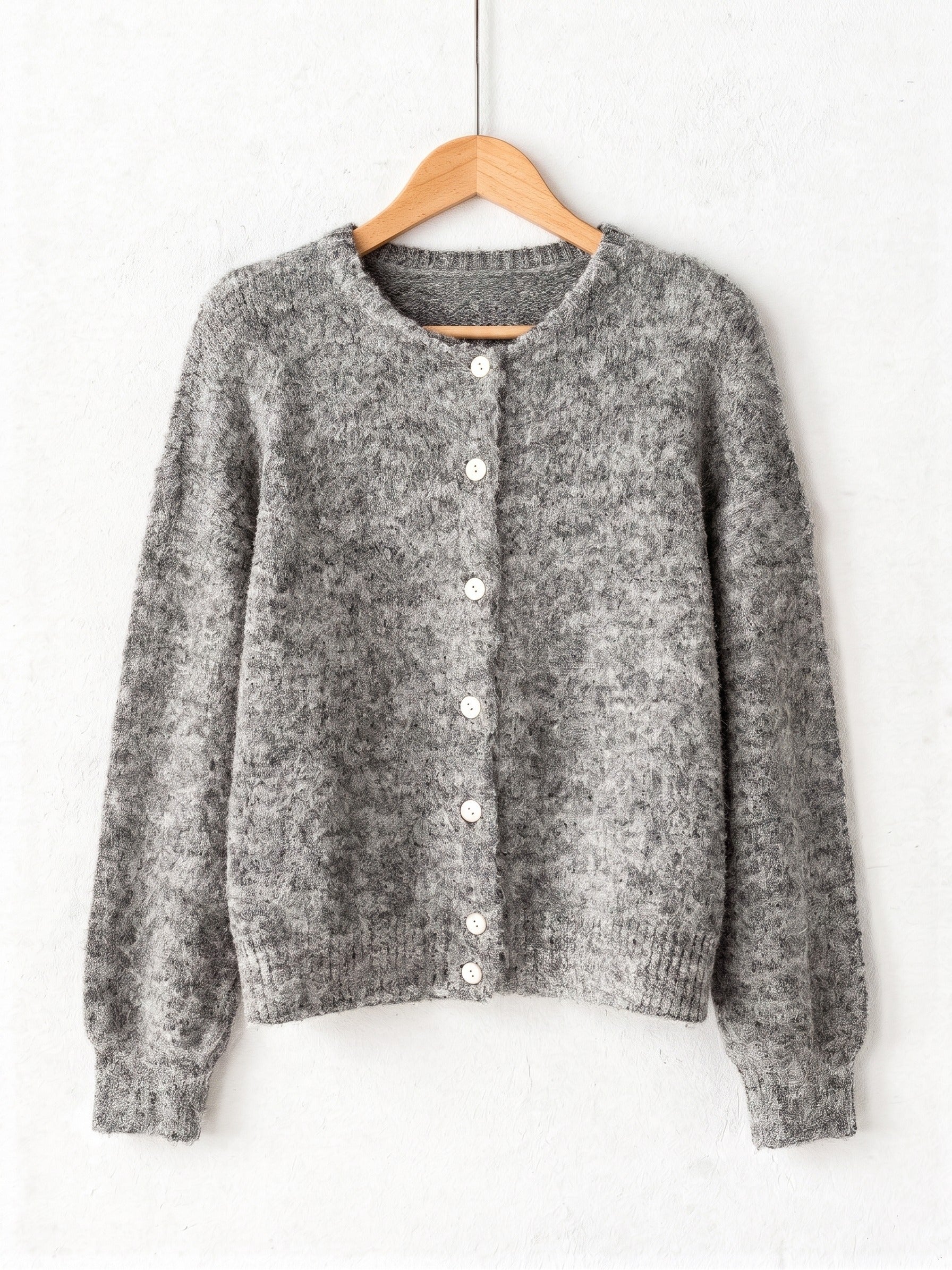 Grey marl button-through cardigan in brushed knit on a wooden hanger
