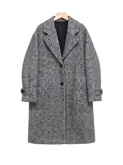 Grey herringbone midi coat on a hanger, single breasted front view