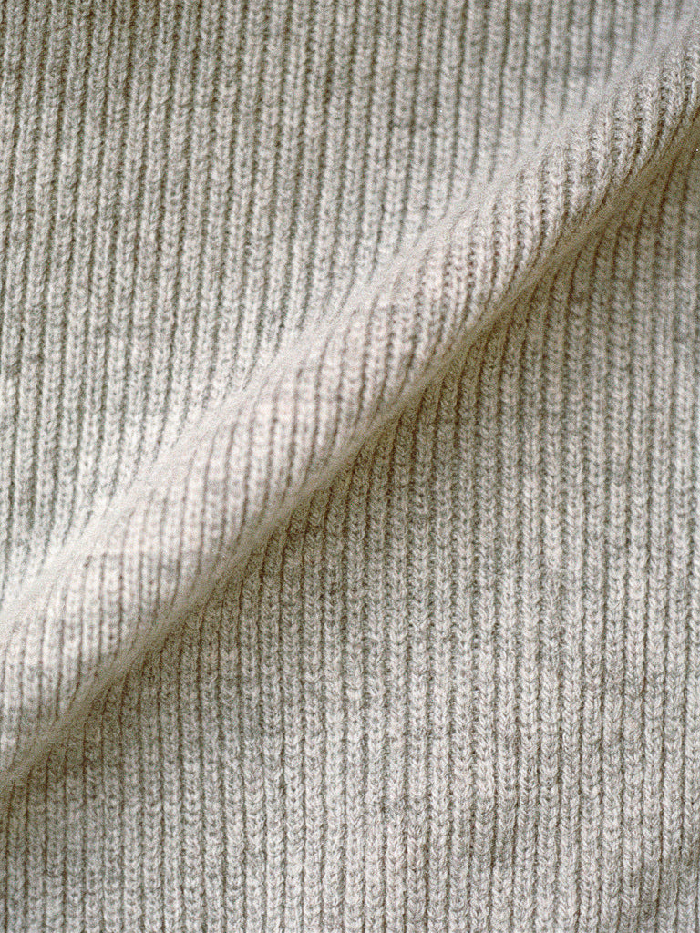 Close-up of the fine vertical rib knit of the Harlbury high neck top