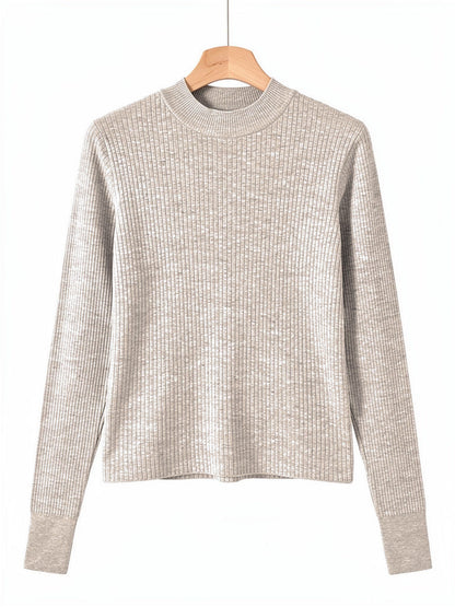 Putty high neck top in a fine rib on a hanger, showing the short standing collar and the deep ribbed cuffs