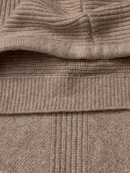 Close-up of the fine vertical rib knit and folded hood edge of the Didbrook knitted hood