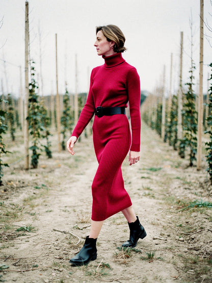Knitted midi dress in Cherry Red, belted fine-rib bodycon, worn in a winter hop garden