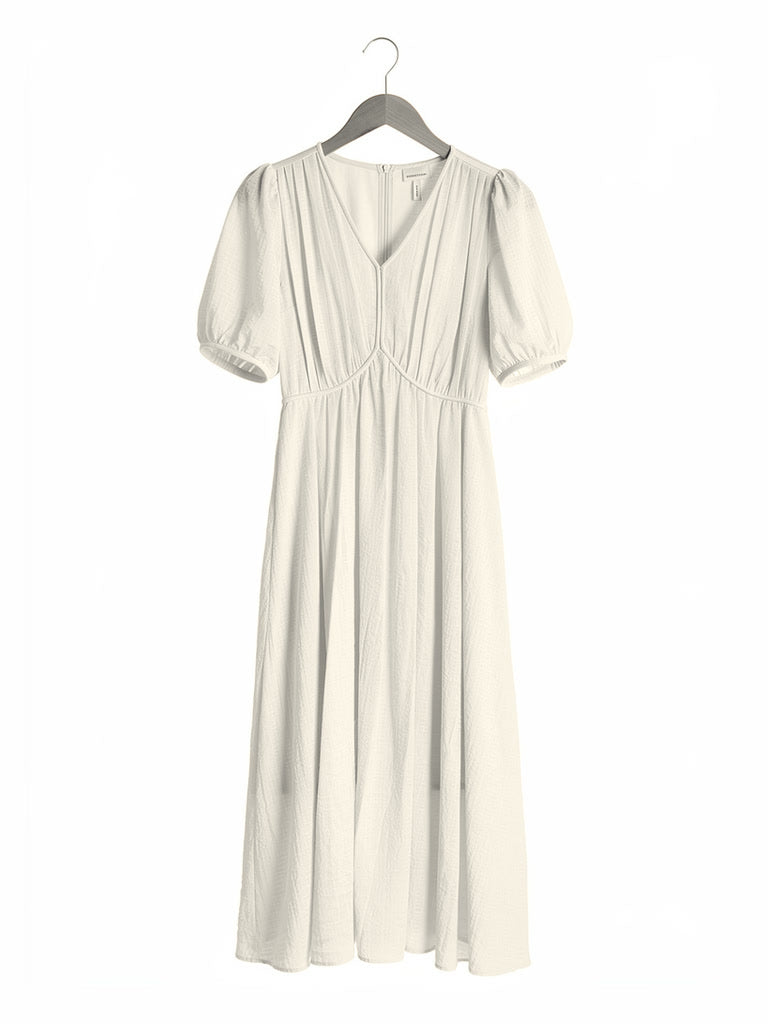Long dress in Candlelight on a hanger, showing the V neck, short puff sleeves and full skirt