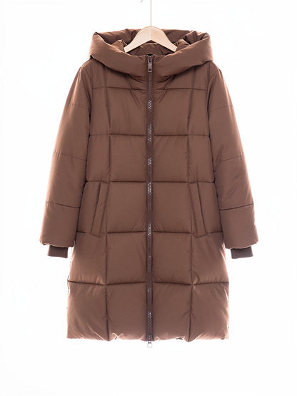 Brown puffer coat in Cocoa Brown on a hanger, front view showing the large box quilting