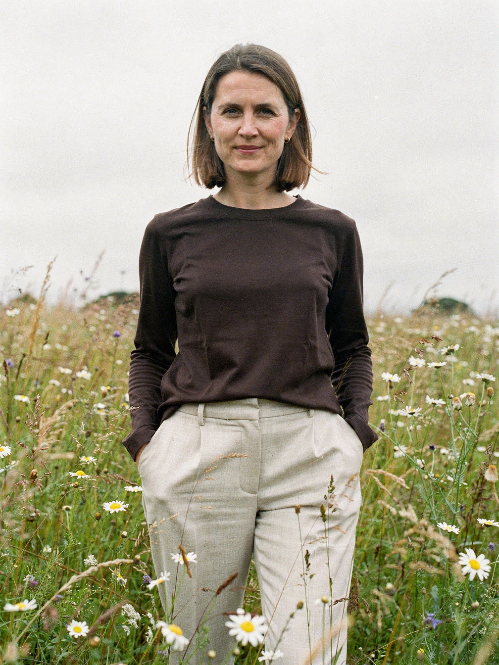 Womens long sleeve top in espresso lyocell jersey, worn in a summer meadow