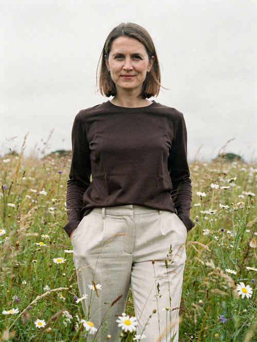 Womens long sleeve top in espresso lyocell jersey, worn in a summer meadow