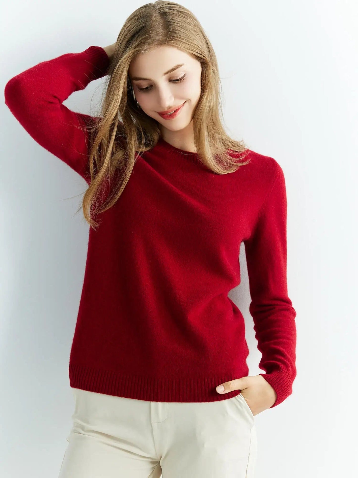 Burgundy 100% merino wool crew neck jumper worn, studio photo