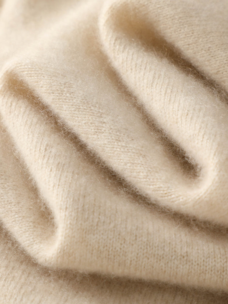 Close up of the fine merino knit of the roll neck knitted vest