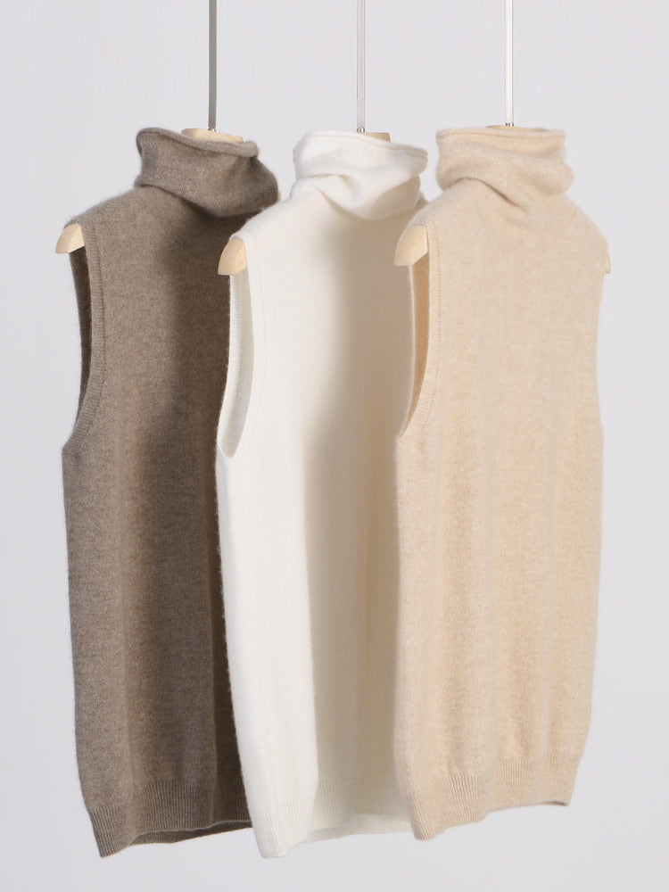 The merino roll neck knitted vest in Mushroom, Porcelain and Biscuit