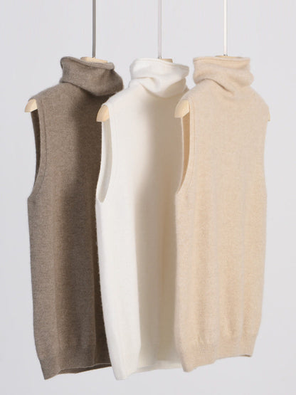 The merino roll neck knitted vest in Mushroom, Porcelain and Biscuit