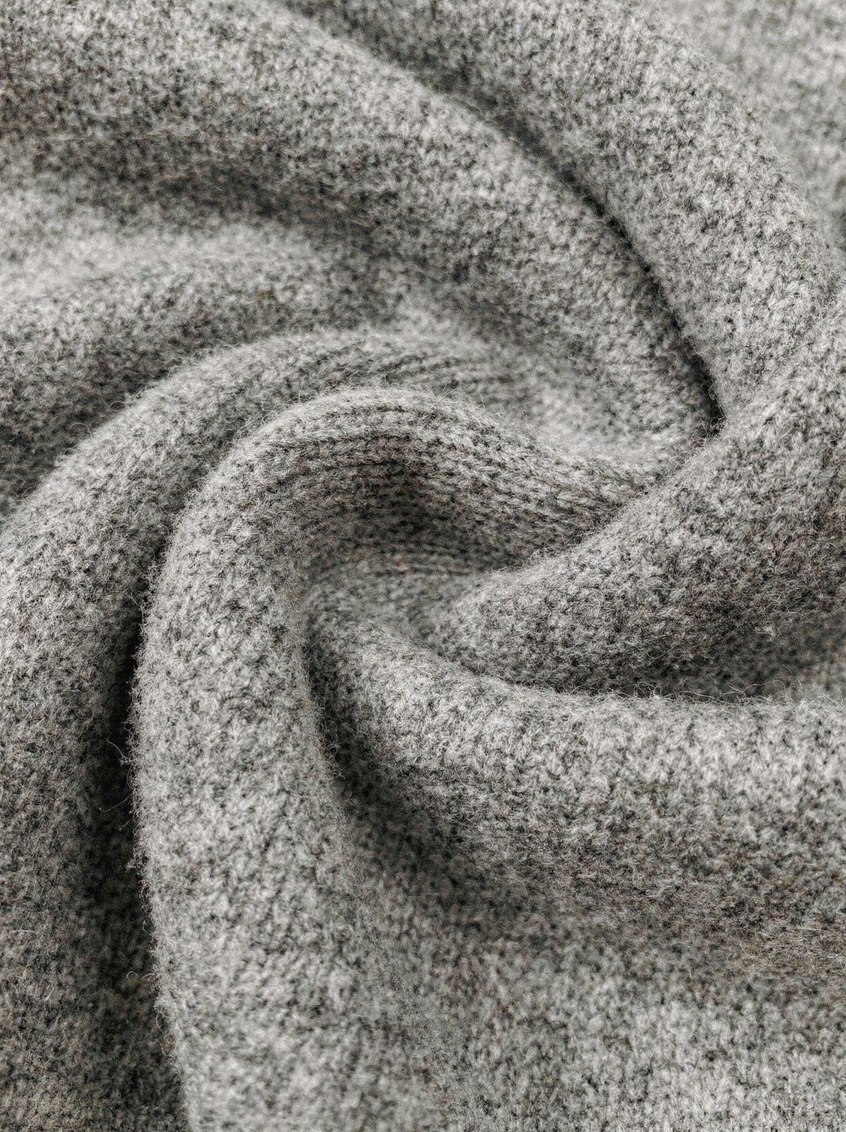 Close up of the extrafine merino wool knit in grey marl